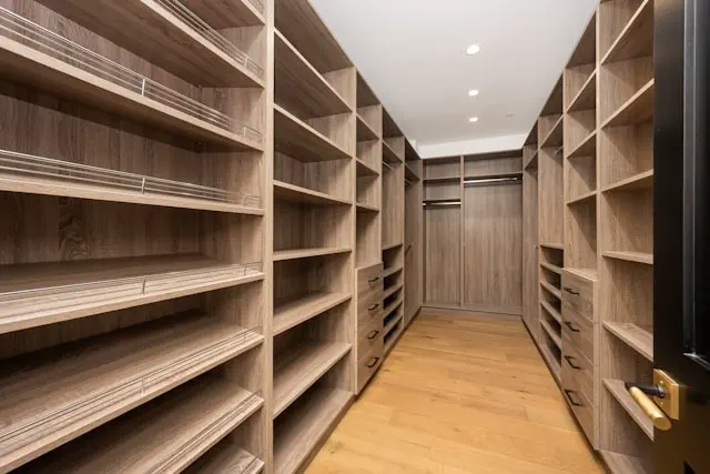 Custom carpentry services in the Dubai showcasing a modern wooden ceiling, large glass windows, and custom interior woodwork craftsmanship in a bright residential space