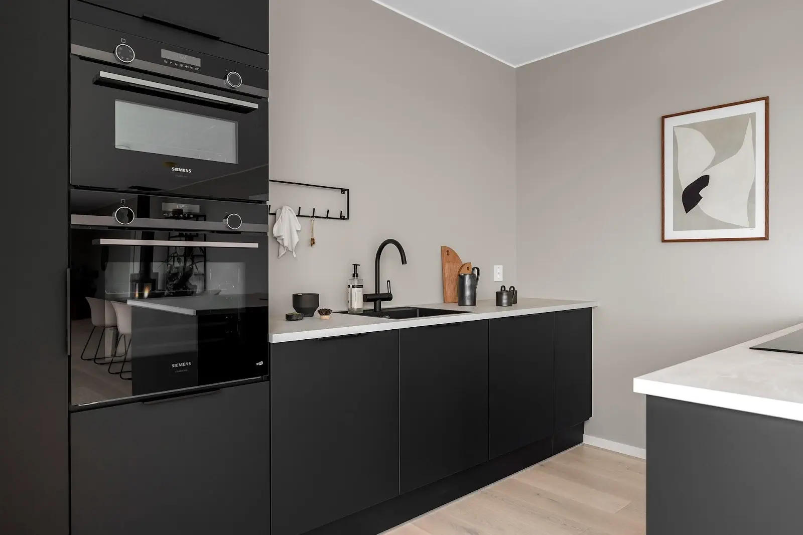 sleek black cabinets in contemporary kitchen